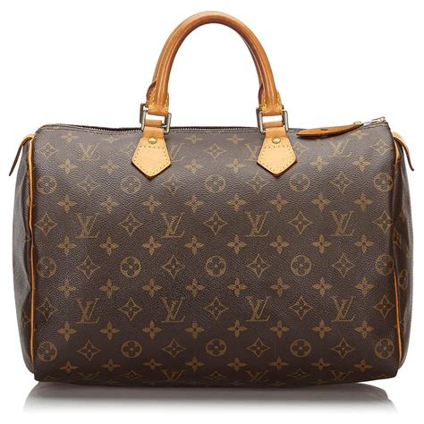 louis vuitton round shoulder bag|Louis Vuitton solid brown bag.